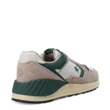Championes urbanos Converse Wave Trainer OX, color marrón claro y verde, con capellada de gamuza y malla, logo de la estrella en el lateral y suela de goma.