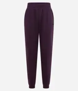 Pantalón deportivo color morado, de algodón y poliéster, con cintura elástica y bolsillos laterales.
