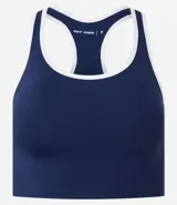 Top deportivo sin copa, color bordó, con escote en U y espalda tipo nadador. Presenta ribetes de color blanco en el contorno del escote y las sisas.