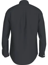 Camisa de popelina de algodón color negro, con cuello abotonado, mangas largas con puños abotonados y logo de Tommy Hilfiger bordado en el pecho. Confeccionada con tecnología Flex que proporciona elasticidad en cuatro direcciones.