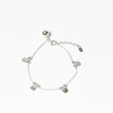 Pulsera de plata 925 con cadena de eslabones y dijes colgantes de discos y bolitas.
