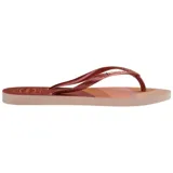 Ojotas Havaianas Slim Palette Glow con base estampada en tonos beige, rosa y marrón, y tiras finas color cobre.