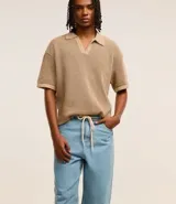 Pantalón de jean celeste, corte baggy relaxed, con cintura con trabillas y cordón ajustable.