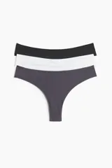 Pack de tres bombachas tipo brazilian de microfibra en colores negro, blanco y gris.