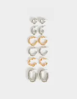 Set de seis pares de aros tipo argolla en diferentes tamaños y acabados: plateado, dorado y plateado texturizado.