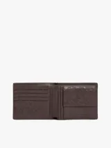 Billetera plegable de cuero texturizado color marrón, con múltiples ranuras interiores para tarjetas, compartimento para billetes, bolsillo para monedas y logo metalizado de Tommy Hilfiger en la parte delantera.