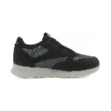 Championes Olympikus Jogging 101 SE, color negro y gris con detalles en naranja.