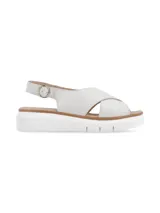Sandalia de cuero color blanco, con tiras cruzadas y hebilla metálica de ajuste. Suela de PU con plataforma.
