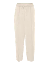 Pantalón de tiro alto color beige, con cintura elástica, cordón ajustable y corte recto.