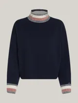 Sweater amplio de mezcla de lana y cachemira, color azul marino, con cuello perkins y detalles en los puños.