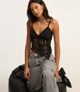 Pantalón de jean gris con bolsillos cargo laterales, corte recto y cintura alta.