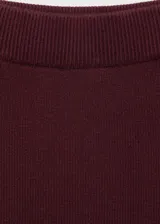 Falda midi negra de punto con goma elástica en la cintura y diseño lápiz.