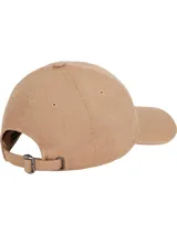 Gorra de béisbol color beige con diseño de espiga, logo de Tommy Hilfiger bordado en el frente y hebilla metálica ajustable en la parte trasera.