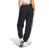 Pantalón largo Adidas Essentials French Terry Cuffed de mujer, color negro con tres tiras blancas a los costados.