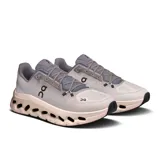 Championes urbanos de hombre, color gris claro con detalles en gris oscuro y suela blanca con orificios.