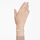 Pulsera dorada con cristales multicolores en talla redonda y talla octogonal. Cierre de mosquetón y cadena de alargue.