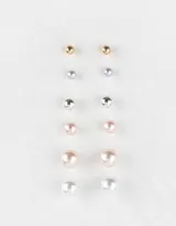 Set de seis pares de aros con perlas de distintos colores y tamaños, con plating de metal y cierre a presión.