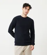 Suéter azul marino de corte slim, cuello redondo y manga larga, confeccionado en algodón texturizado.