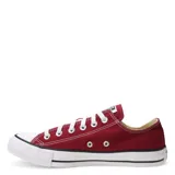 Zapatillas de lona de corte bajo color burdeos con detalles en negro y blanco.
