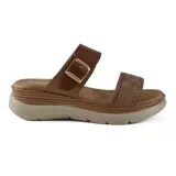 Sandalias casuales Korium Anabel, color negro, con doble tira, una con hebilla ajustable y otra con detalle de costuras. Plataforma con suela marrón.