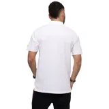 Remera tipo polo color petróleo con cuello de punto acanalado, puños de manga de punto plano y parche de silicona con el logo de Cat en el lado izquierdo del pecho.