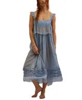 Vestido midi transparente en color azul, con capas y detalles de volantes, ideal para el verano.