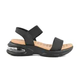 Sandalias bajas color rosa con plataforma blanca y detalle transparente en el talón.