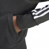 Campera Adidas Originals negra con tres líneas blancas en las mangas y logo bordado en el pecho.