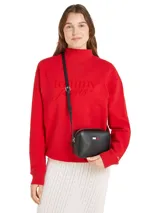 Bandolera negra de Tommy Jeans con correa ajustable, logo de la marca en el frente y cierre superior.