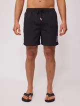 Short de baño color lila con cordón ajustable en la cintura y parche con logo de la marca en la pierna.