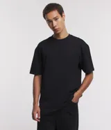 Remera relaxed de algodón con efecto grueso, color azul marino, cuello redondo y manga corta.