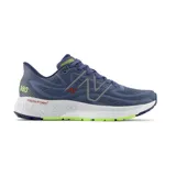 Championes de running New Balance modelo Fresh Foam X 880v12, color azul con detalles en gris, blanco y verde.