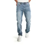 Pantalón de jean color verde militar, de corte slim, con cinco bolsillos y logo CAT en la parte trasera.