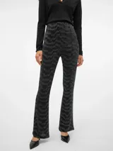 Pantalón negro con lurex plateado, tiro alto y corte bootcut.