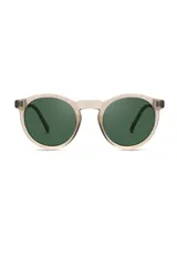 Lentes de sol Eco Shades modelo Fontana, con montura redonda color beige y lentes verdes. Fabricados con acetato biodegradable y lentes de PMMA reciclado.