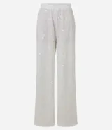 Pantalón wide leg de lentejuelas color blanco, con cintura alta y elástica.