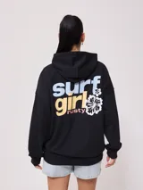 Canguro beige con capucha, estampado frontal con el texto "Australian Surfgirl Rusty" y un hibisco blanco.