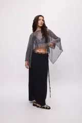 Poncho de gasa color celeste, de talle único.