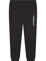 Pantalón de jogging negro con cintura elástica, bolsillos laterales y logo de Calvin Klein estampado en blanco en la pierna derecha.