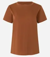 Blusa básica de algodón color tostado, de manga corta con dobladillo y nudo frontal.