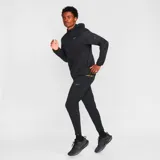 Pantalón largo negro Dri-Fit, diseñado para proporcionar comodidad durante la actividad física, con ajuste regular y bolsillos laterales.
