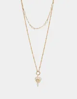 Collar doble dorado, con cadena de eslabones y cadena con perlas. Dije de corazón de piedra natural con aplique de estrella y perla colgante.