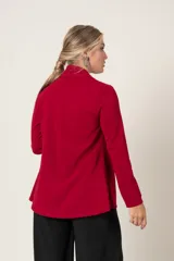 Blazer suelto rojo de corte italiano, sin botones y de manga larga.