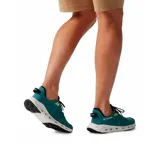 Zapatillas Columbia Drainmaker XTR para hombre, color verde azulado con detalles en negro y amarillo. Zapatilla de agua ligera y de secado rápido, con ventilación superior y tacos de goma microdentados para una tracción segura.