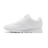 Championes Reebok Classic Leather blancos, de estilo casual y deportivo, con detalles en rojo y azul.