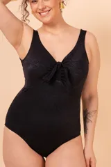 Malla entera negra con textura y nudo en el escote.