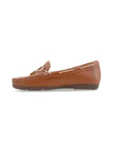 Mocasín de cuero graneado color verde oscuro, con interior de cuero con pelo, cordón de cuero a contratono con punteras metálicas y suela de TR.