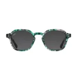 Lentes de sol Indie con montura redonda de acetato con estampado botánico en tonos verdes y grises.