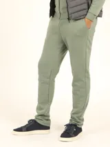 Pantalón de jogging verde oliva de corte recto, con cintura elastizada, cordón ajustable y bolsillos laterales.
