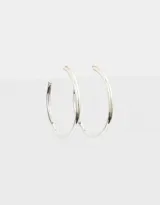 Aros tipo argolla bañados en plata.